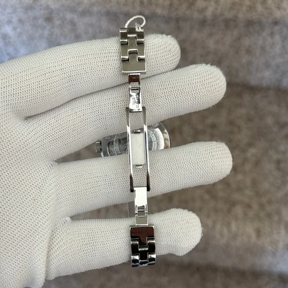 Movado Silver and Gold-Tone Watch
Trend Bangle Watch, 34mm - Picture 5 of 11